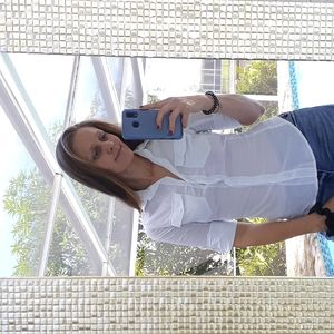 White mid sleeve button up shirt